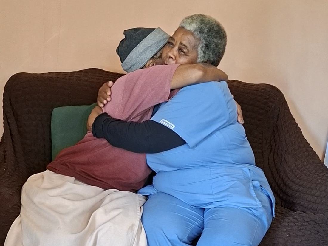 A HospiceWits nurse caring for a patient at home